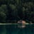 brown wooden house on lake