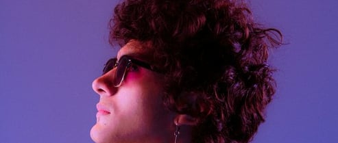 woman in black shirt wearing sunglasses
