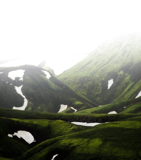 green mountain under white sky during daytime