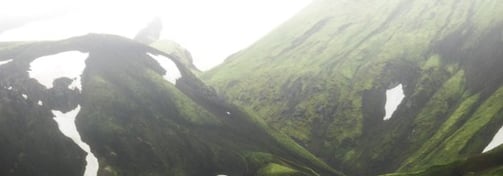 green mountain under white sky during daytime