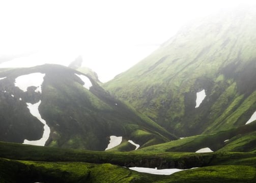 green mountain under white sky during daytime