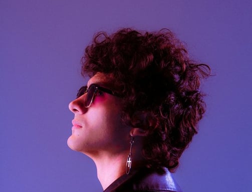 woman in black shirt wearing sunglasses