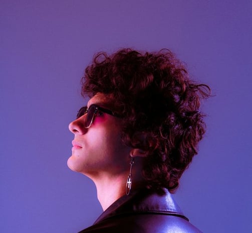 woman in black shirt wearing sunglasses