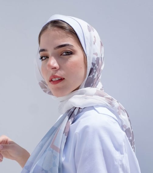 woman in white hijab smiling