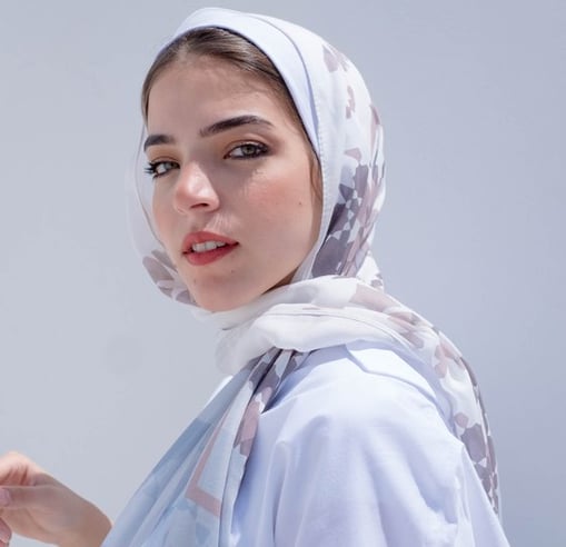 woman in white hijab smiling