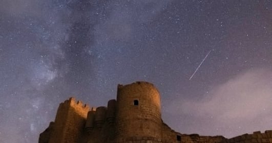 brown concrete building under starry night