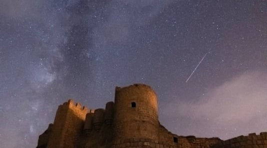 brown concrete building under starry night