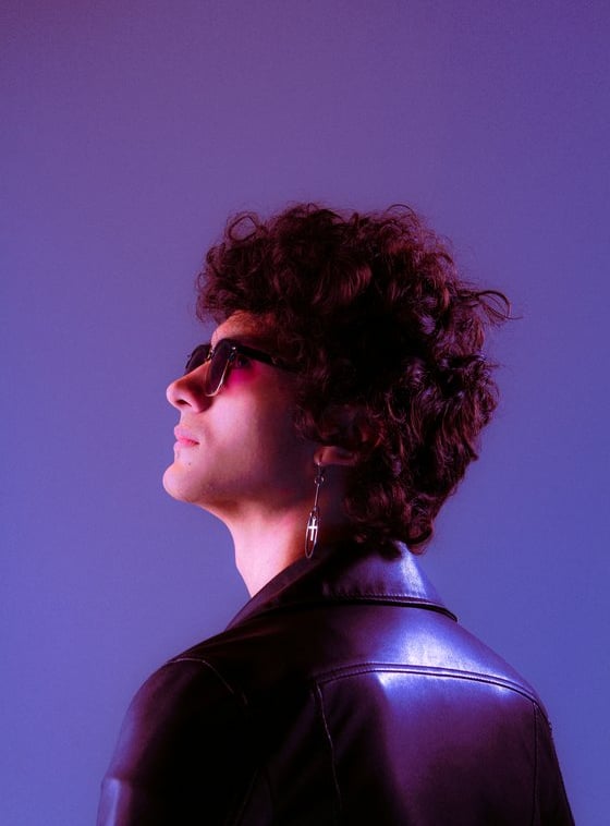 woman in black shirt wearing sunglasses