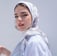 woman in white hijab smiling