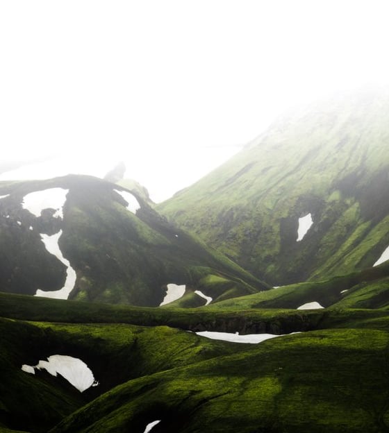 green mountain under white sky during daytime