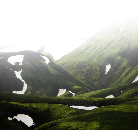 green mountain under white sky during daytime