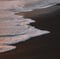 ocean waves crashing on shore during daytime