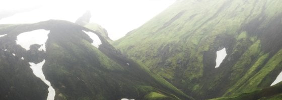 green mountain under white sky during daytime