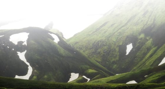 green mountain under white sky during daytime