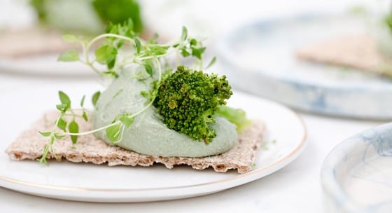 green vegetable on white ceramic plate