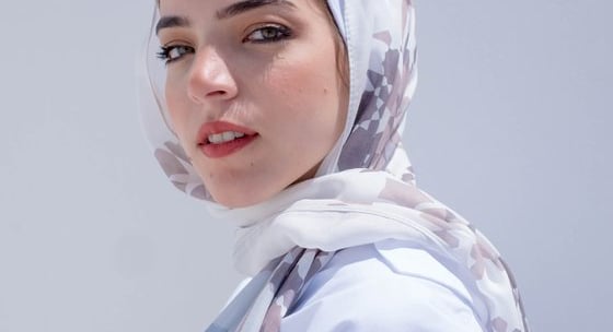 woman in white hijab smiling