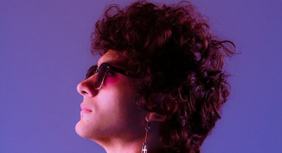 woman in black shirt wearing sunglasses