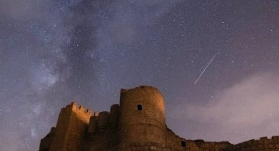 brown concrete building under starry night