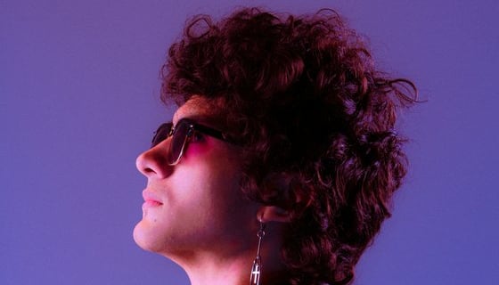 woman in black shirt wearing sunglasses