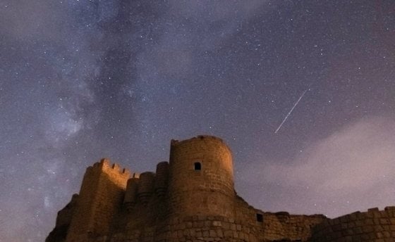 brown concrete building under starry night