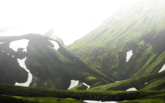 green mountain under white sky during daytime