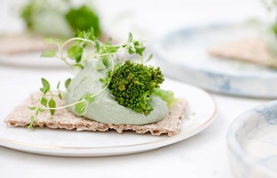 green vegetable on white ceramic plate