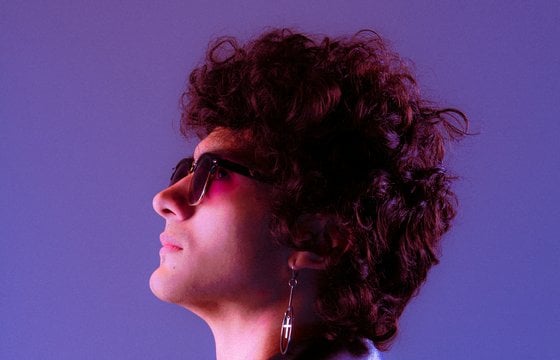 woman in black shirt wearing sunglasses