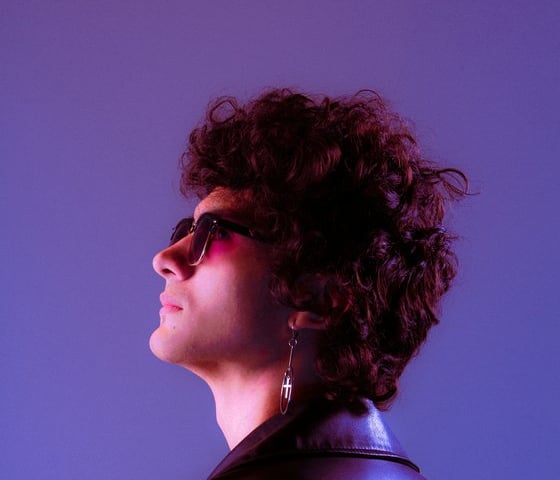 woman in black shirt wearing sunglasses