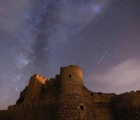 brown concrete building under starry night