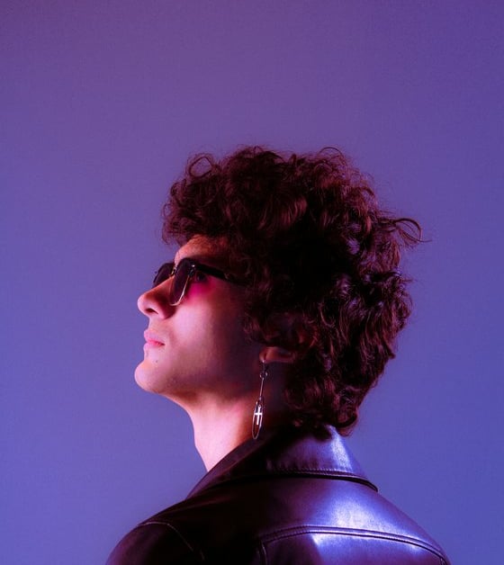 woman in black shirt wearing sunglasses