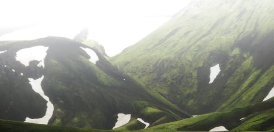 green mountain under white sky during daytime