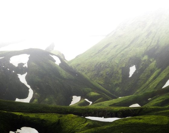 green mountain under white sky during daytime