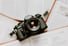 black nikon dslr camera on white printer paper