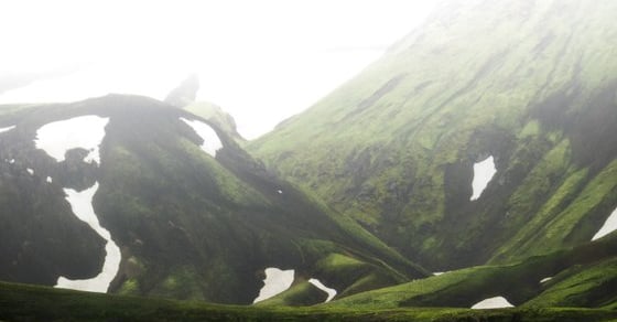 green mountain under white sky during daytime
