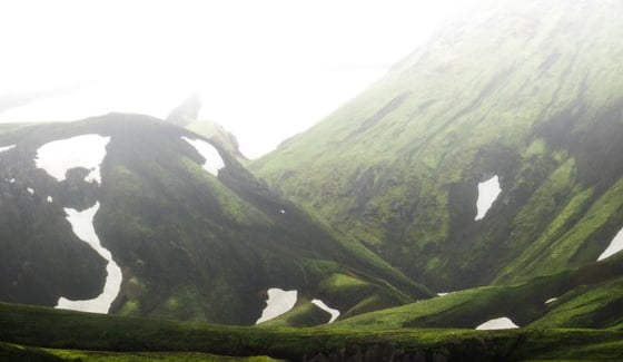 green mountain under white sky during daytime