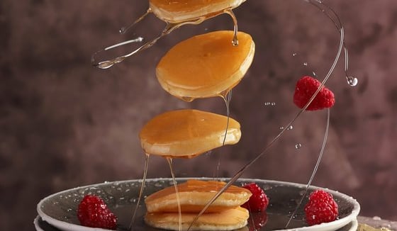 sliced fruit on white ceramic plate
