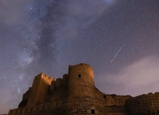 brown concrete building under starry night