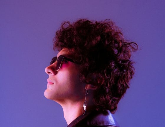 woman in black shirt wearing sunglasses