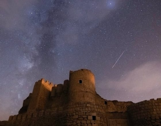 brown concrete building under starry night