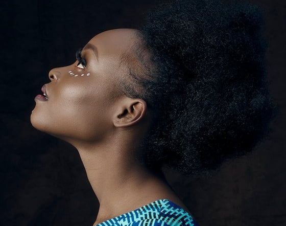 woman in blue and white shirt