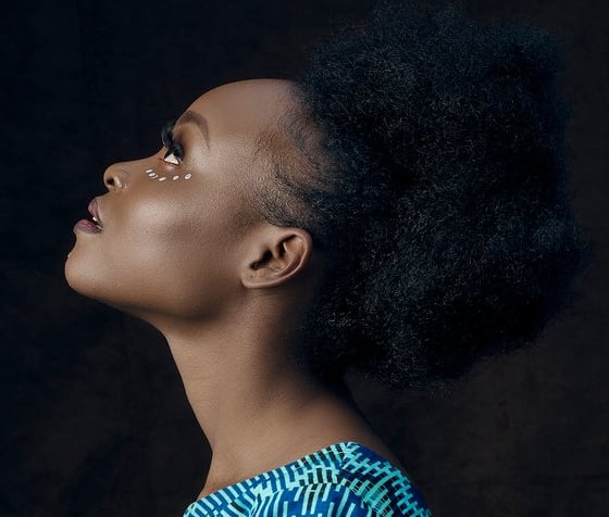 woman in blue and white shirt