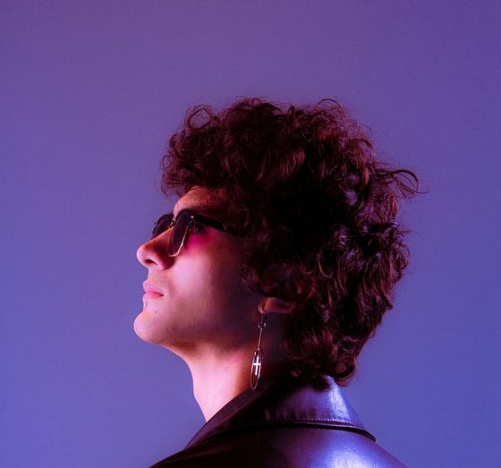 woman in black shirt wearing sunglasses