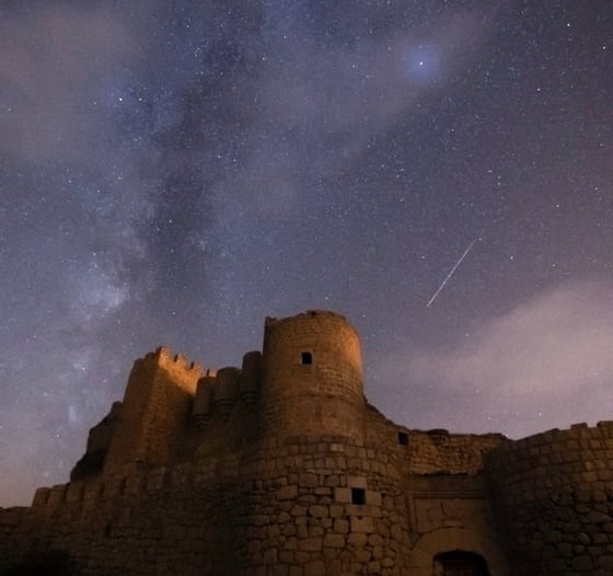 brown concrete building under starry night