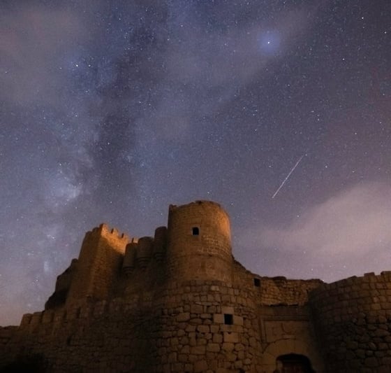 brown concrete building under starry night
