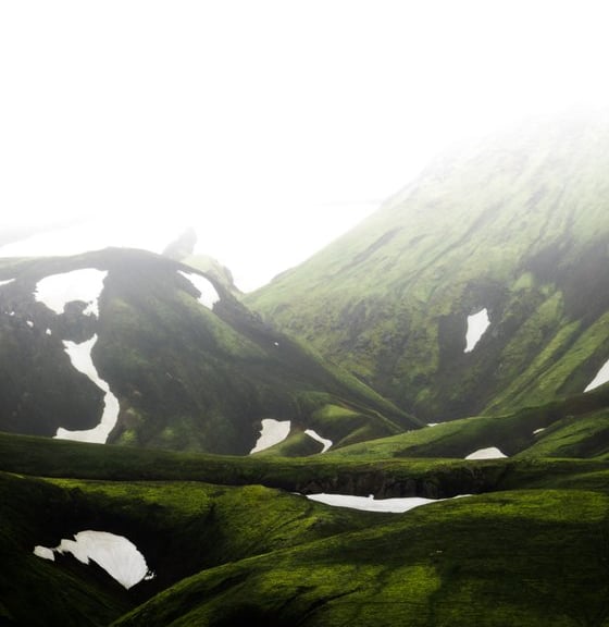 green mountain under white sky during daytime