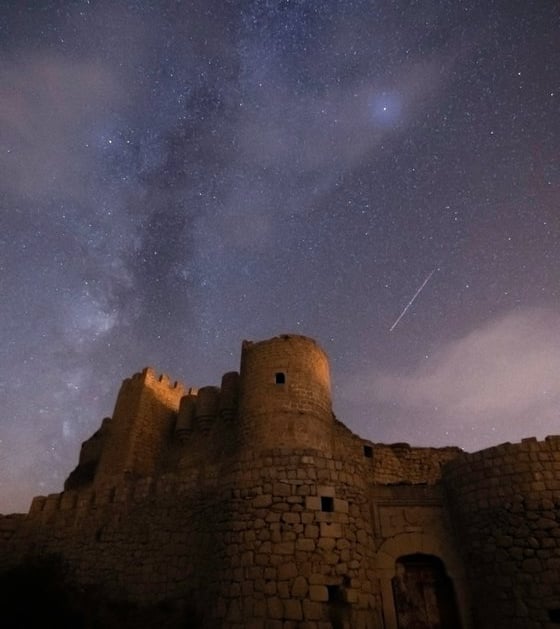 brown concrete building under starry night