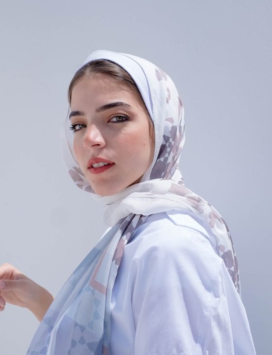 woman in white hijab smiling