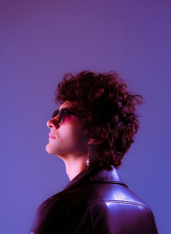 woman in black shirt wearing sunglasses