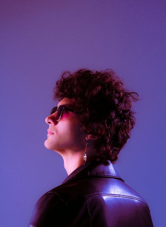 woman in black shirt wearing sunglasses