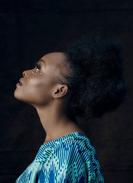 woman in blue and white shirt